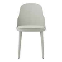 Elegant grey chair with a smooth finish and cushioned white seat, perfect for modern decor.