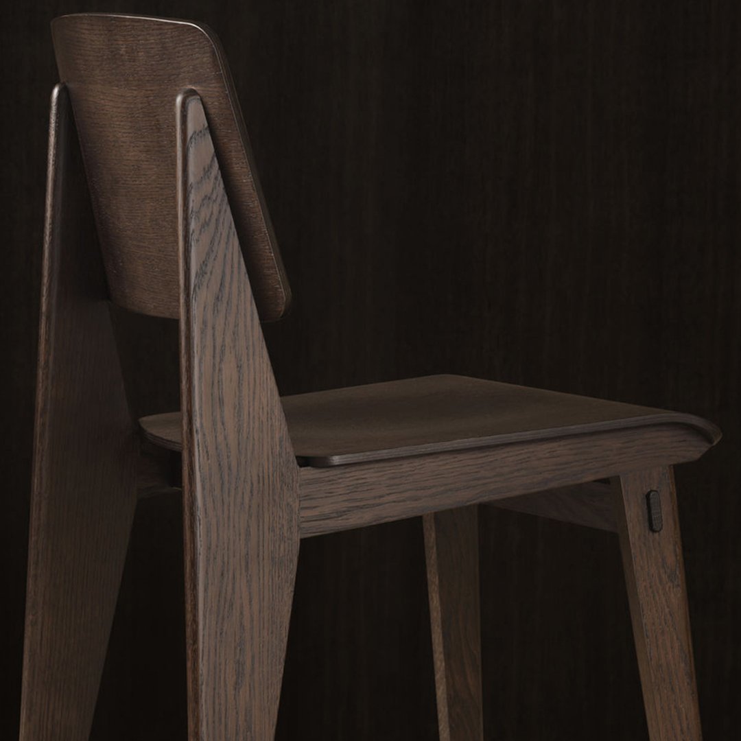 "Solid dark wood chair with clean lines and a minimalist design, featuring a rich, deep brown finish."