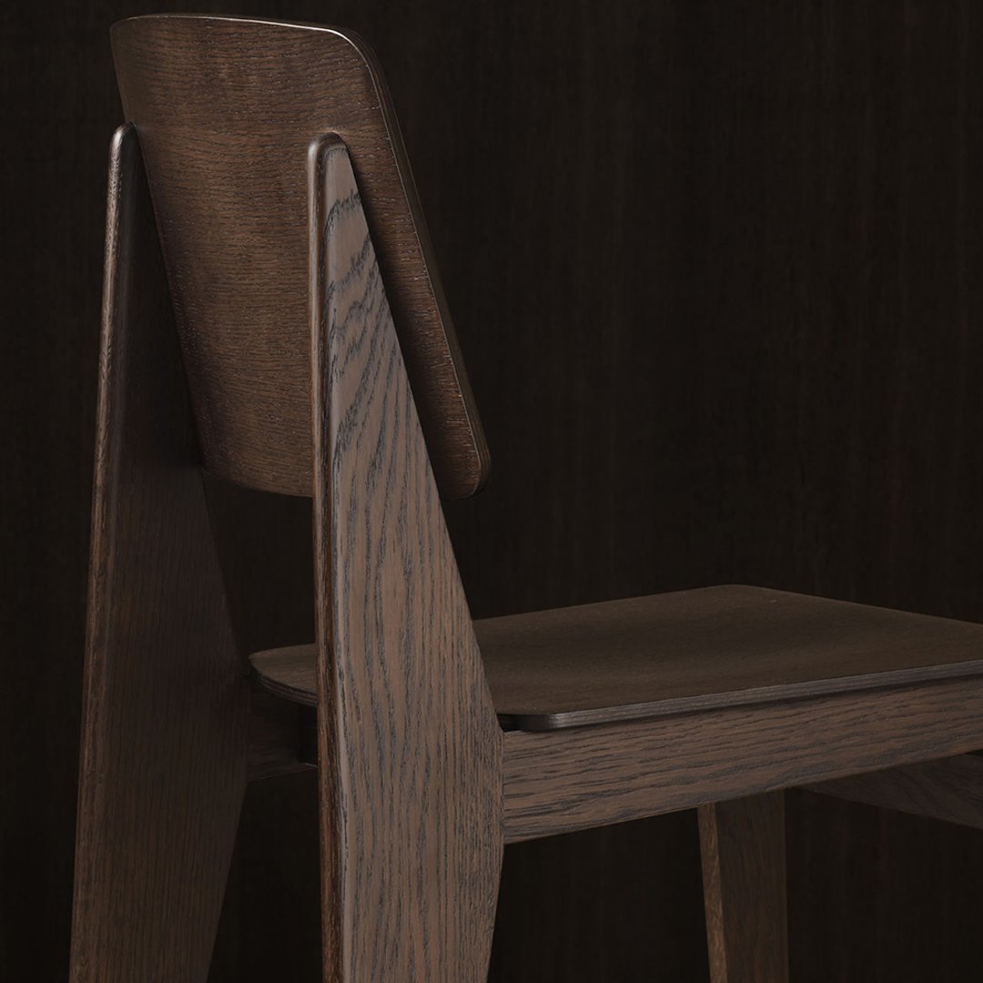 Dark wood chair with a sleek, minimalist design featuring rich, deep brown tones and smooth, subtle grain patterns.
