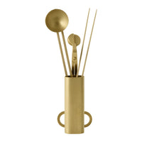 Elegant gold kitchen utensil holder with various golden tools, showcasing a sleek, modern design.
