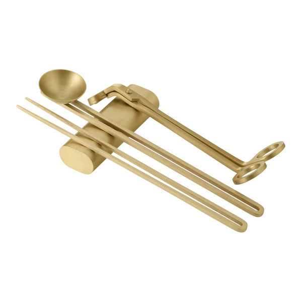 Gold kitchen utensil set featuring sleek, minimalist design with a polished finish and subtle, modern details.