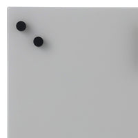 Gray surface with two black round knobs, minimalist design and smooth texture. Perfect for modern spaces.
