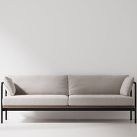 Black woven chair with a curved backrest and sleek metal frame, showcasing a modern and minimalist design.