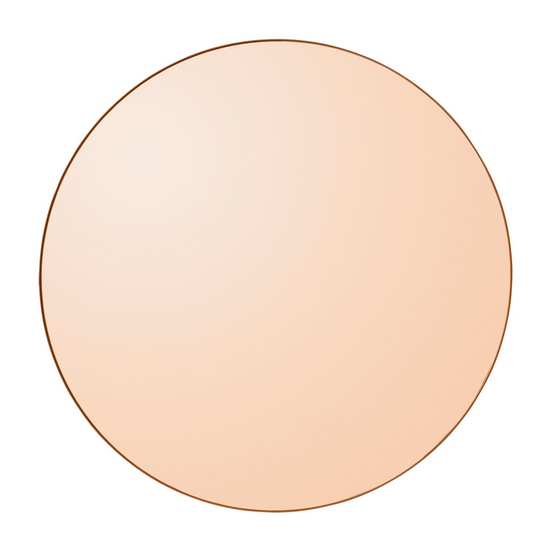 Round mirror with a soft peach gradient and a sleek copper edge, perfect for modern decor.