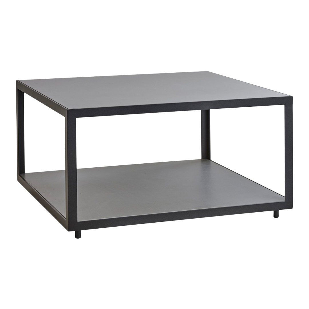 Modern black square coffee table with a minimalist design and smooth surfaces, featuring an open shelf for storage.