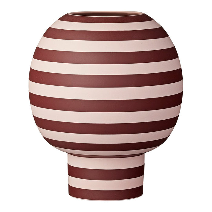Round vase featuring bold maroon and cream horizontal stripes for a modern aesthetic. Perfect for any decor style.