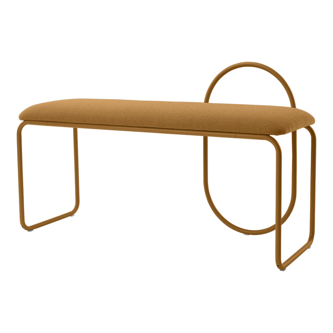 "Modern mustard yellow upholstered bench with sleek geometric metal frame."
