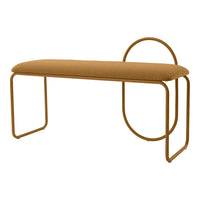 "Modern mustard yellow upholstered bench with sleek geometric metal frame."