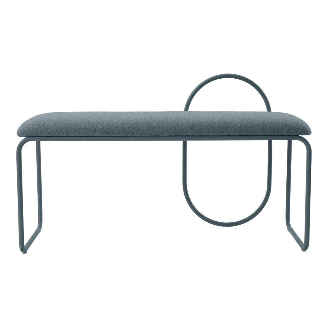 Modern gray bench with a sleek design, featuring a smooth cushion and minimalist circular accents.