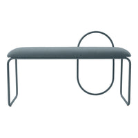 Modern gray bench with a sleek design, featuring a smooth cushion and minimalist circular accents.