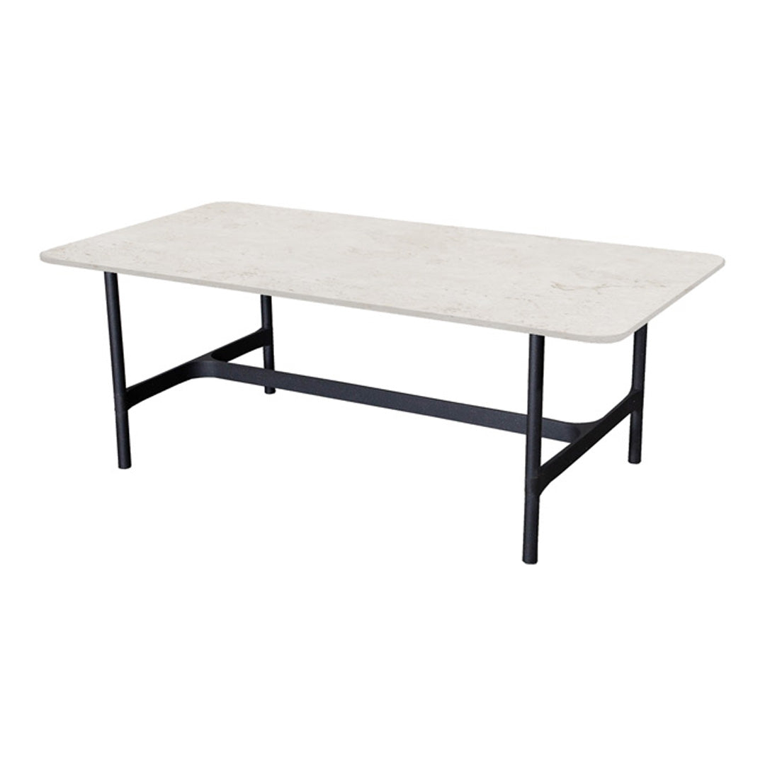 Light gray tabletop with subtle veining, matte finish, supported by a sleek black metal frame.