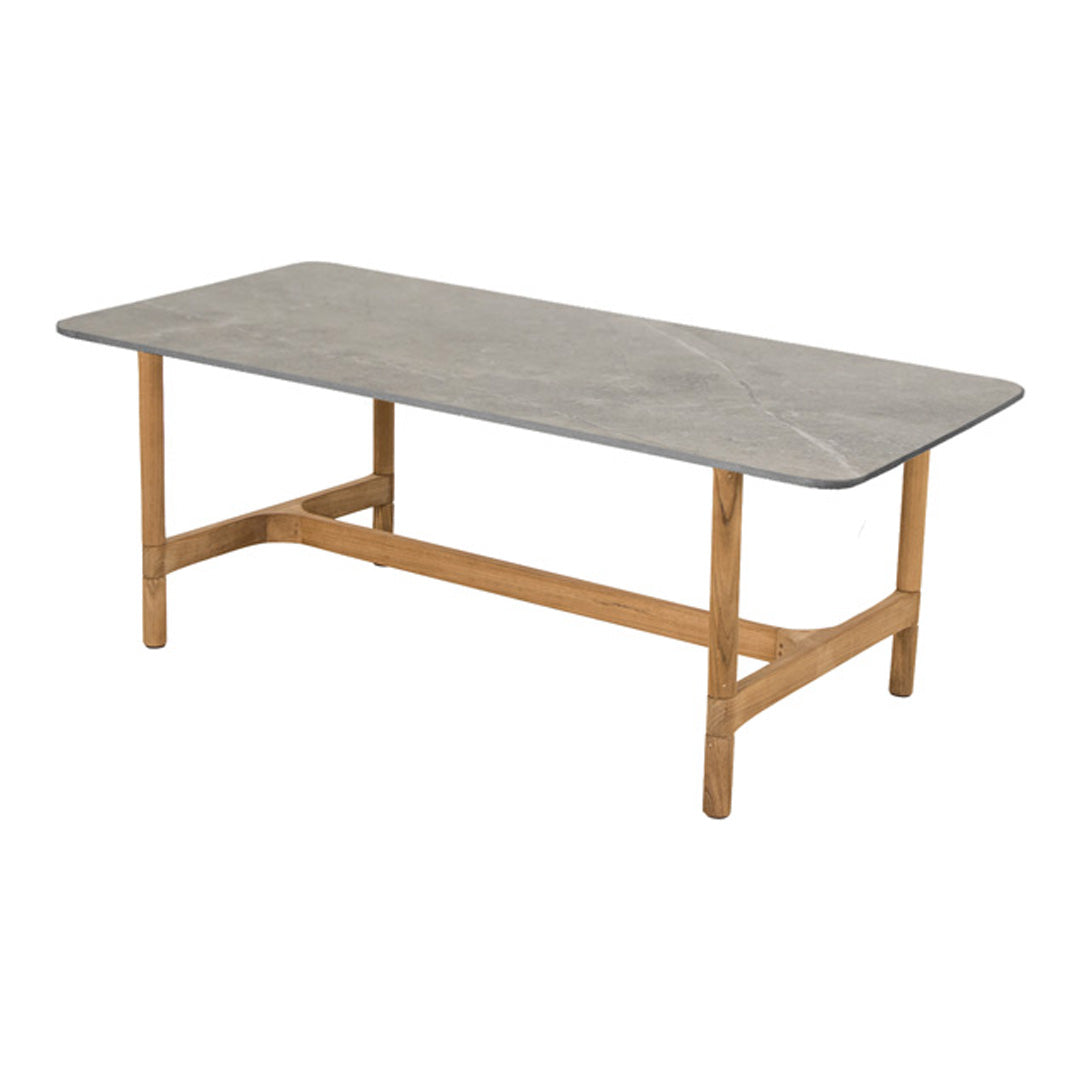 Gray marble tabletop with subtle veining, set on a natural wood frame for a modern, elegant look.