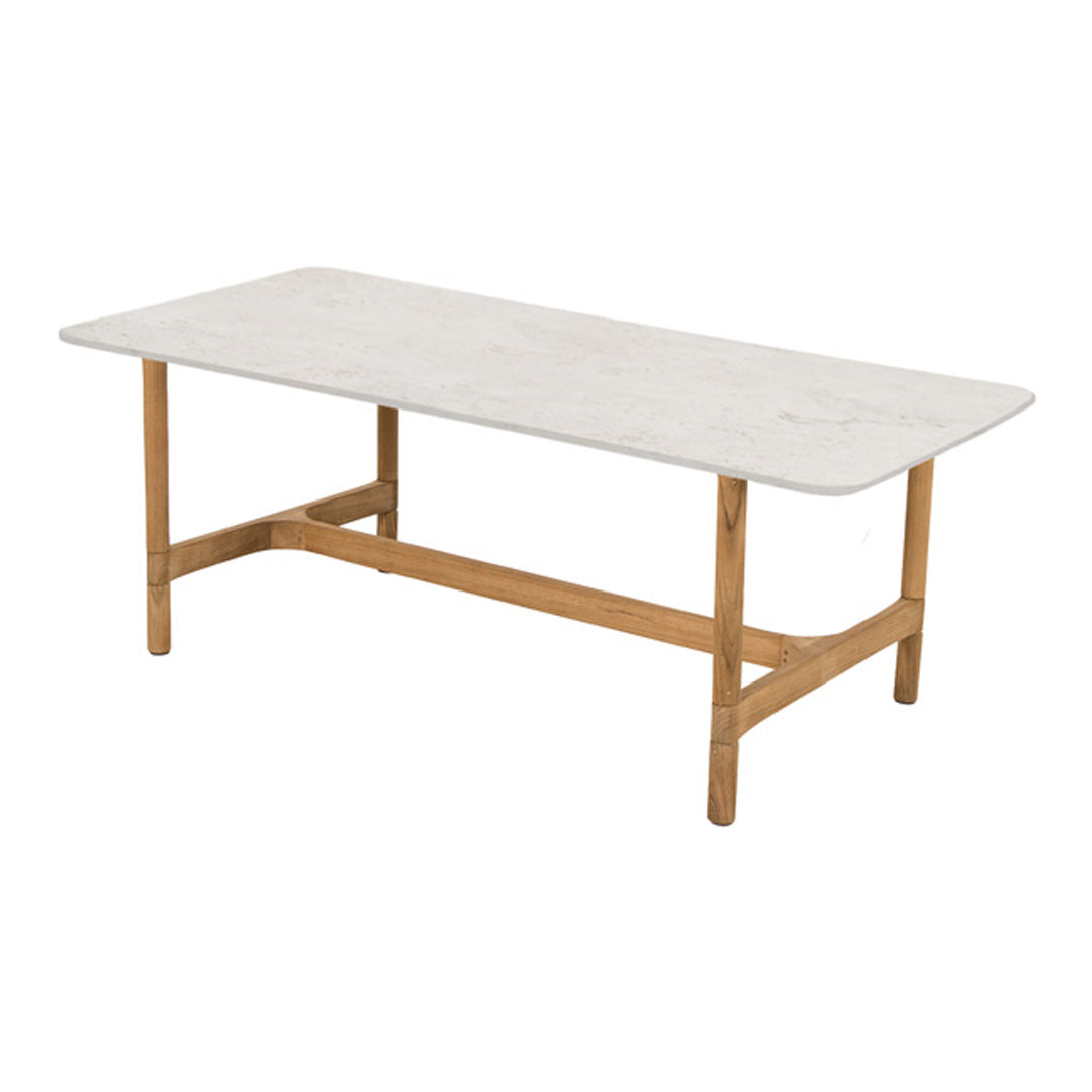White marble tabletop with subtle gray veining and light wood legs for a modern, chic design.