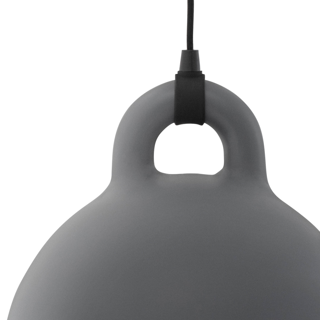 Gray hanging lamp with a smooth, rounded design and a simple black cord for a minimalist aesthetic.
