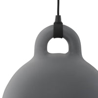 Gray hanging lamp with a smooth, rounded design and a simple black cord for a minimalist aesthetic.