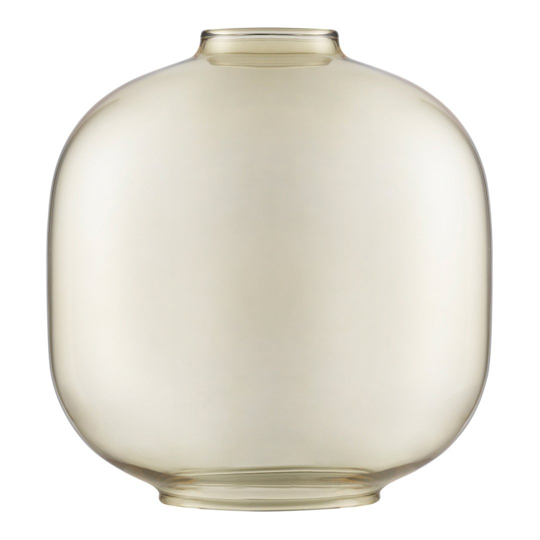 Clear glass vase with a rounded shape and soft amber hue, perfect for modern decor. Smooth, minimalist design.