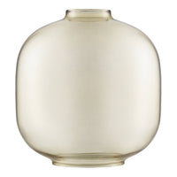 Clear glass vase with a rounded shape and soft amber hue, perfect for modern decor. Smooth, minimalist design.