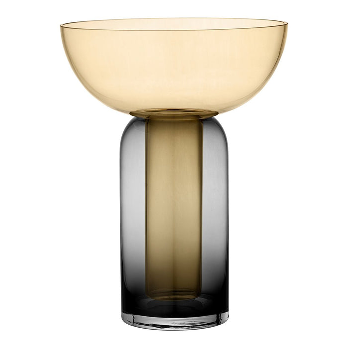 Two-tone glass vase featuring a gradient of amber and smoky gray hues. Sleek modern design.