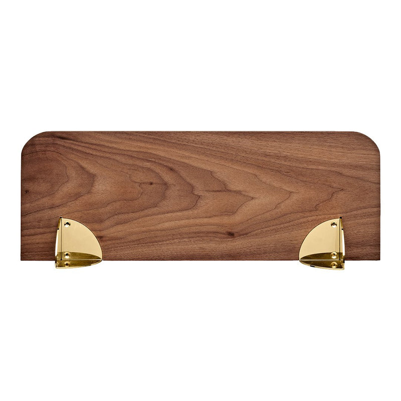Rich walnut wood shelf with smooth grain, featuring sleek gold metal brackets. Elegant and stylish design.