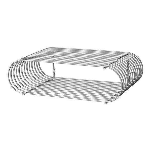 Sleek silver wire shelf with a modern, curved design and minimalist open pattern, perfect for stylish storage solutions.
