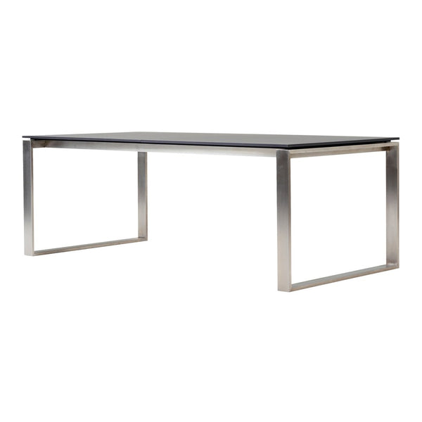 Modern rectangular table with a sleek black top and stainless steel frame, featuring minimalist design and clean lines.