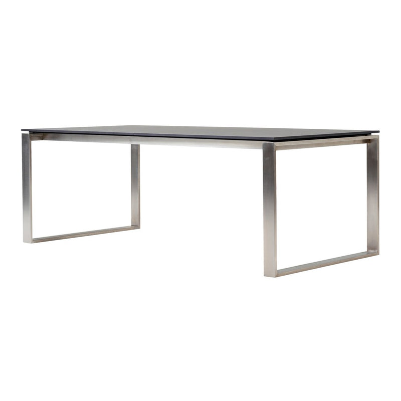 Modern rectangular table with a sleek black top and stainless steel frame, featuring minimalist design and clean lines.