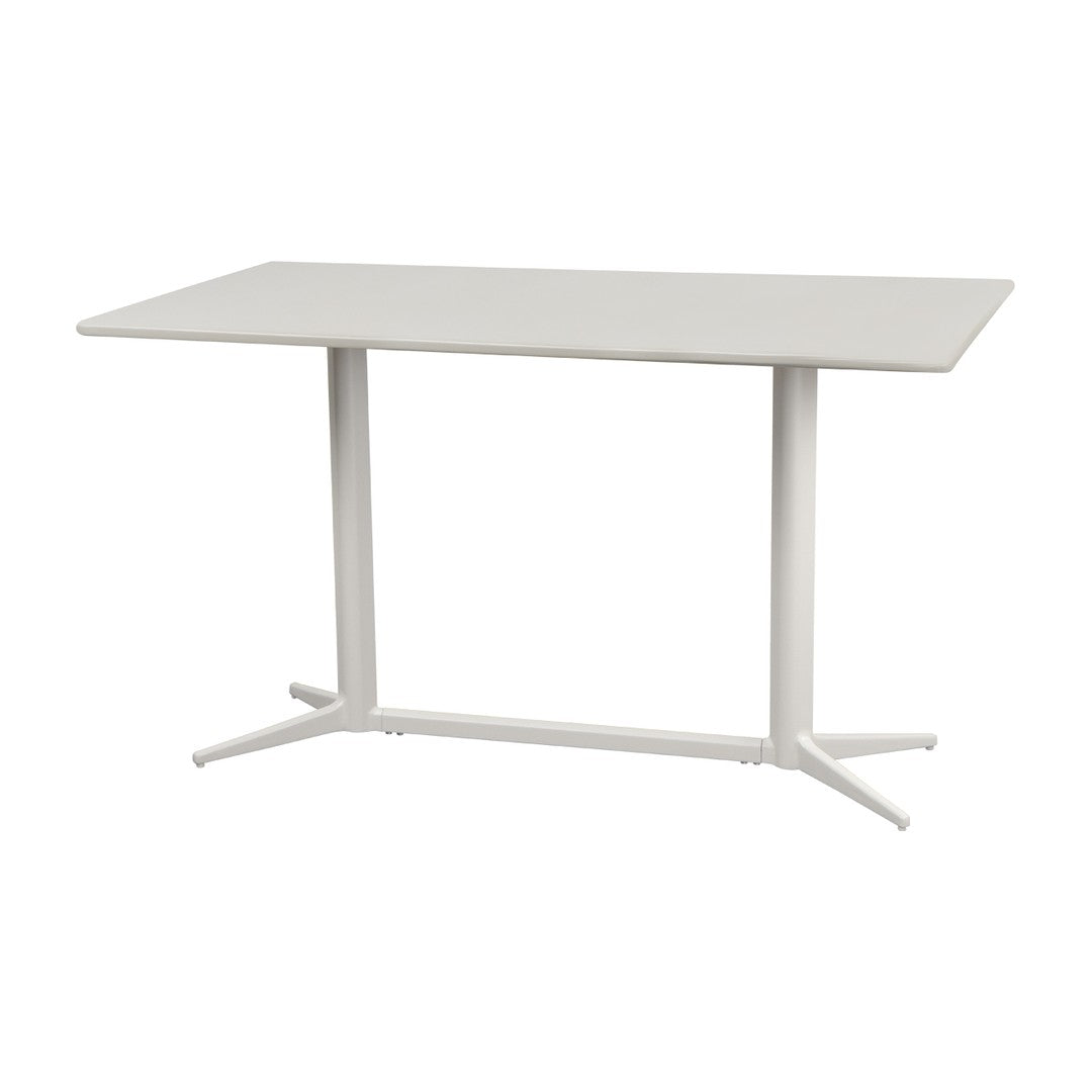 Stylish white rectangular table with a smooth surface and sleek metallic legs for a modern look.