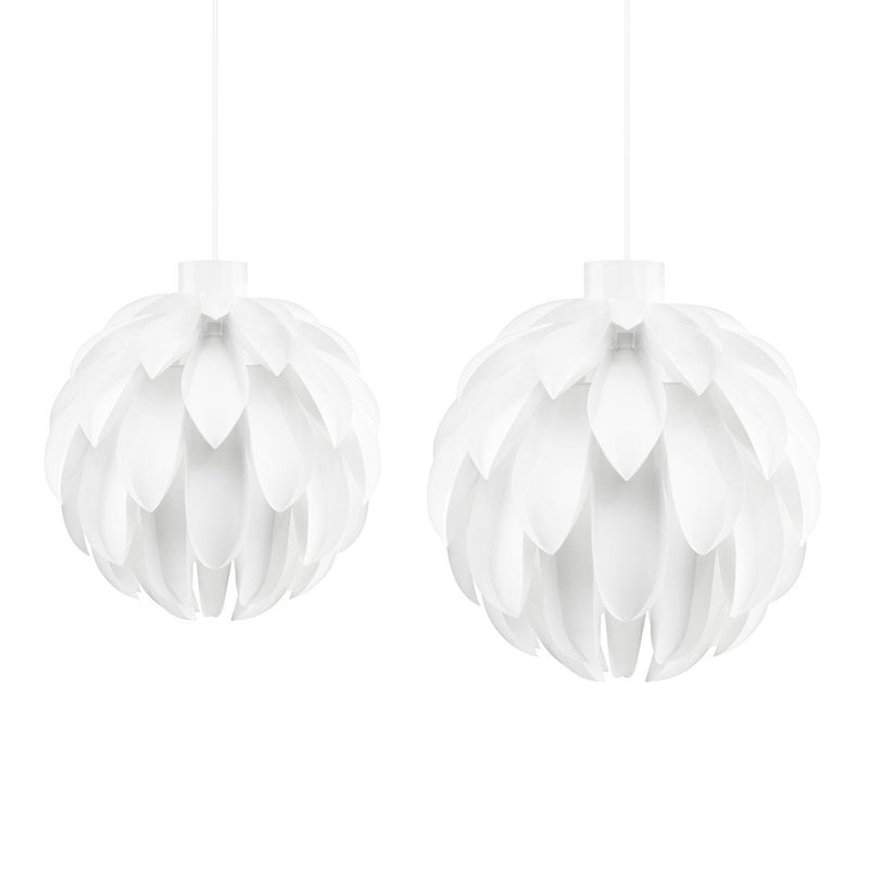 White pendant lights featuring a floral petal design, perfect for modern decor. Elegant and minimalistic.