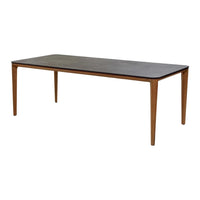 Rectangular brown wooden table with smooth top and tapered legs, featuring a modern, minimalist design.