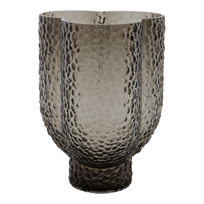 Textured gray glass vase with a hammered finish, featuring a unique pattern and a modern shape. Ideal for décor.