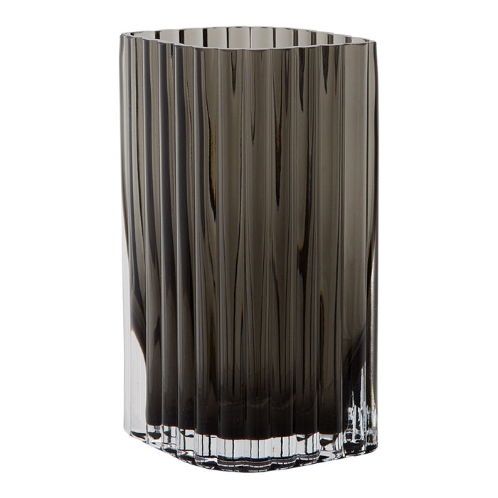 Tall, ribbed vase in smoky gray glass with a sleek, modern design and subtle gradients. Perfect for elegant decor.
