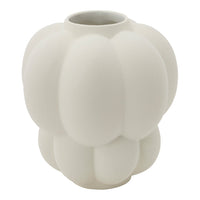 White ceramic vase with a soft, organic shape and a textured, rounded pattern, perfect for modern decor.