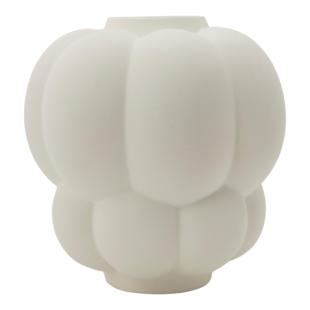 White decorative vase with a soft, rounded, tiered pattern, perfect for modern home decor.