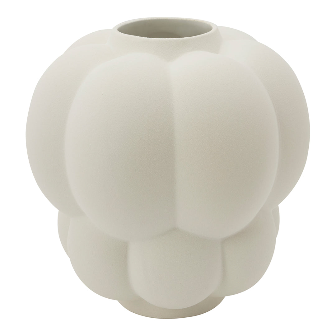White ceramic vase with a smooth, rounded design and soft, bulbous pattern. Perfect for modern decor.