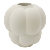 White ceramic vase with a smooth, rounded design and soft, bulbous pattern. Perfect for modern decor.