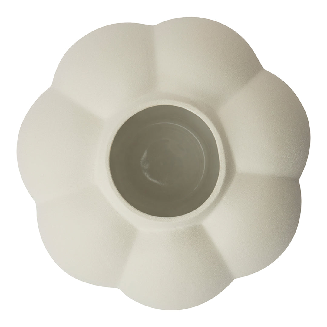 Soft white ceramic vase with a floral shape and subtle textured pattern, perfect for home decor.