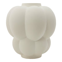 "White, matte glass vase with a unique, rounded, bubble-like pattern for modern decor."