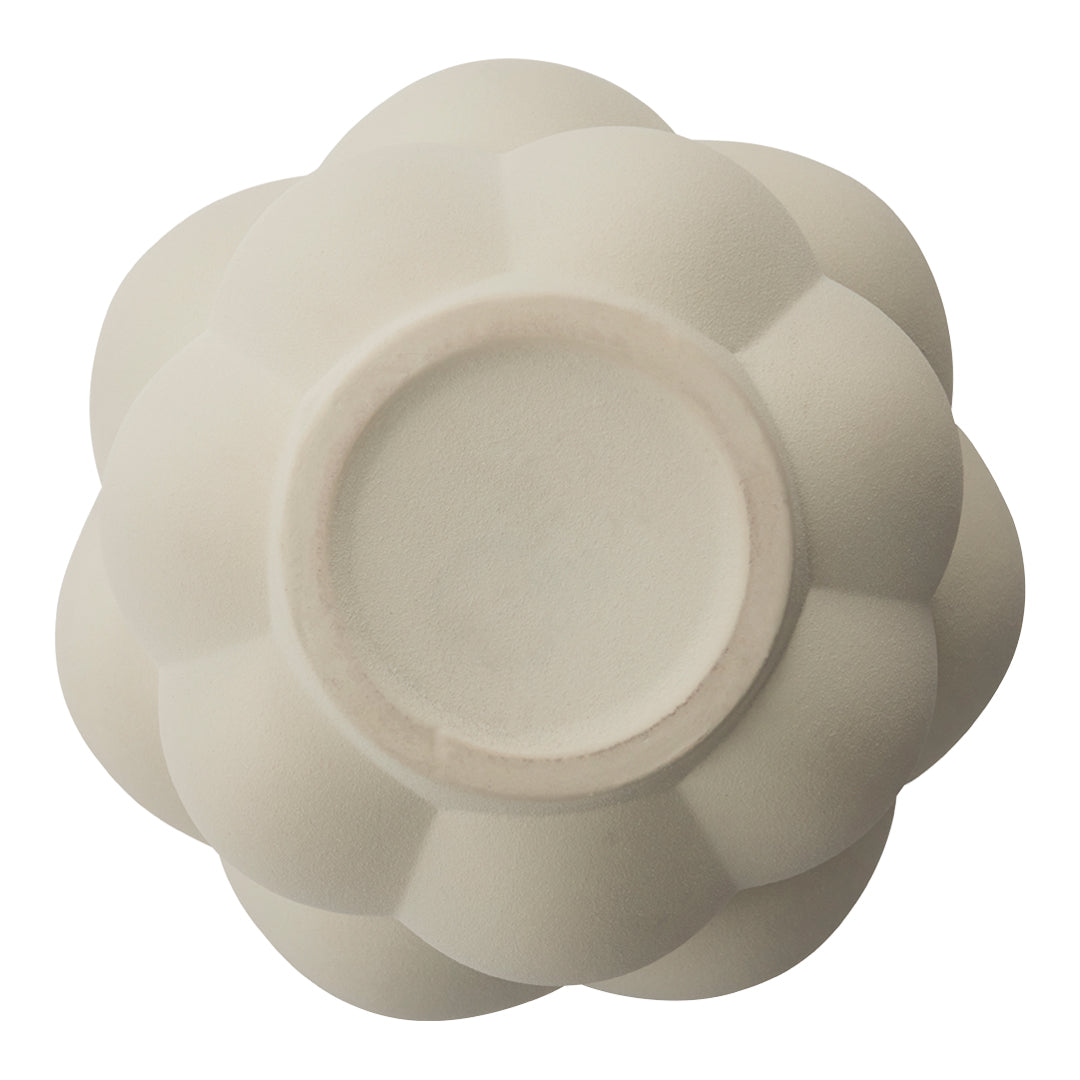 White floral-shaped ceramic bowl with a smooth, matte finish and subtle detailing around the edges.
