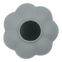 Gray flower-shaped planter with a smooth matte finish and a deep black interior. Perfect for modern decor.