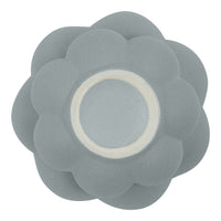 Soft gray flower-shaped silicone mold with rounded petals and a white center. Ideal for baking and crafting.