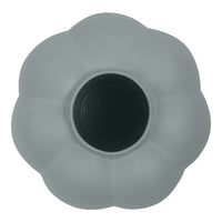 Gray flower-shaped pot with a smooth surface and a black interior. Elegant, minimalist design for modern decor.