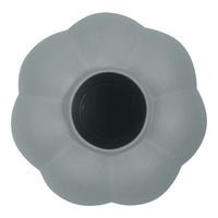 Gray flower-shaped planter with a smooth finish and a black interior for a modern touch.