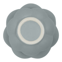 Gray silicone bowl with a layered flower design and a white inner rim. Ideal for modern, chic kitchen decor.