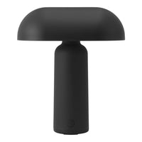 Black minimalist lamp with a smooth, rounded shade and a sleek, cylindrical base, perfect for modern decor.