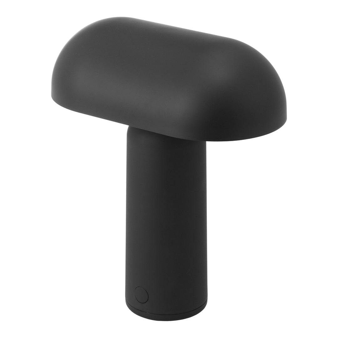 Black minimalist mushroom-shaped table lamp on a cylindrical base, featuring a smooth matte finish.