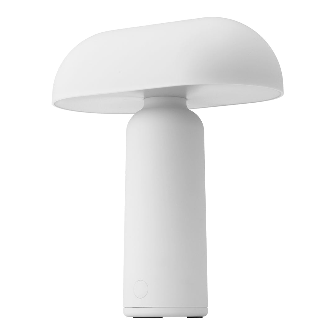 White mushroom-shaped table lamp with a smooth, minimalist design, featuring a matte finish. Perfect for modern decor.