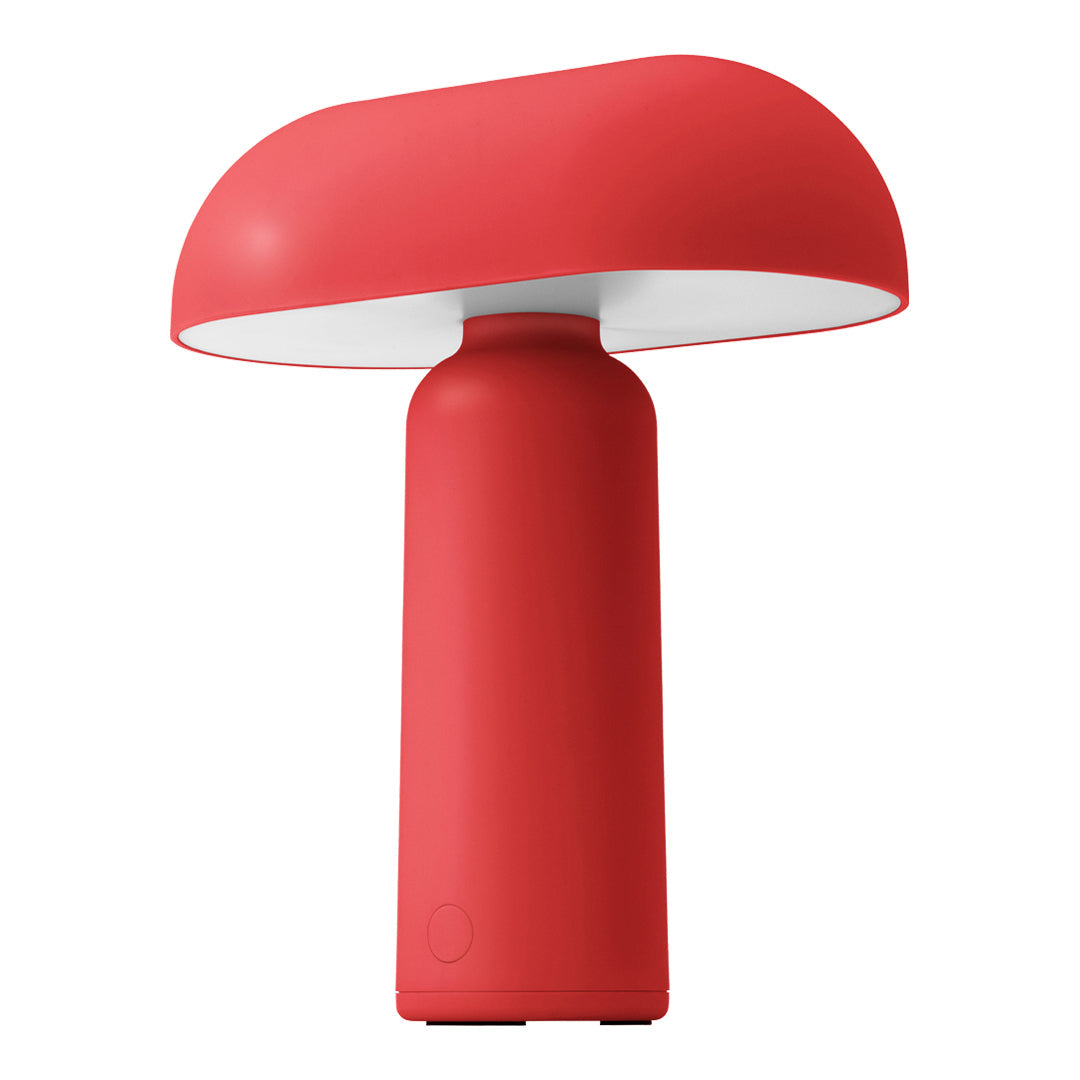 Red mushroom-shaped table lamp with a smooth, matte finish and a white shade. Perfect for modern decor.