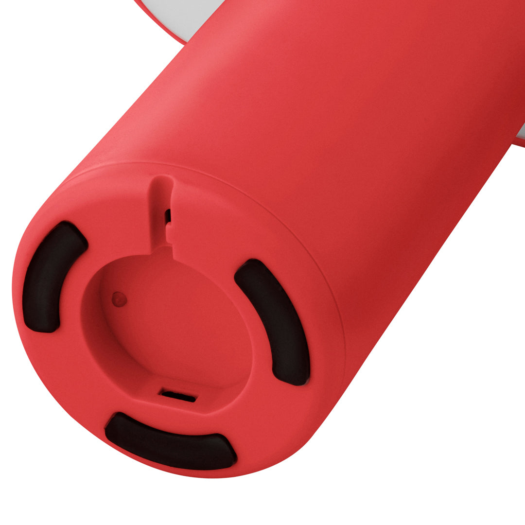 Round red device base with black accents and textured surface, showcasing vibrant color and sleek design.