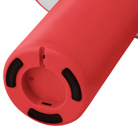 Round red device base with black accents and textured surface, showcasing vibrant color and sleek design.