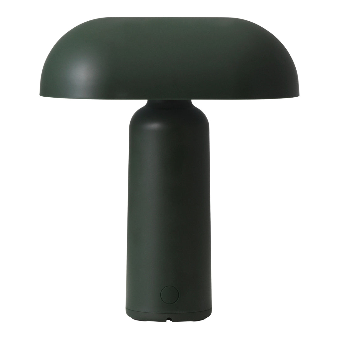 Green dome-shaped table lamp with a smooth, modern finish and minimalistic design. Ideal for contemporary decor.